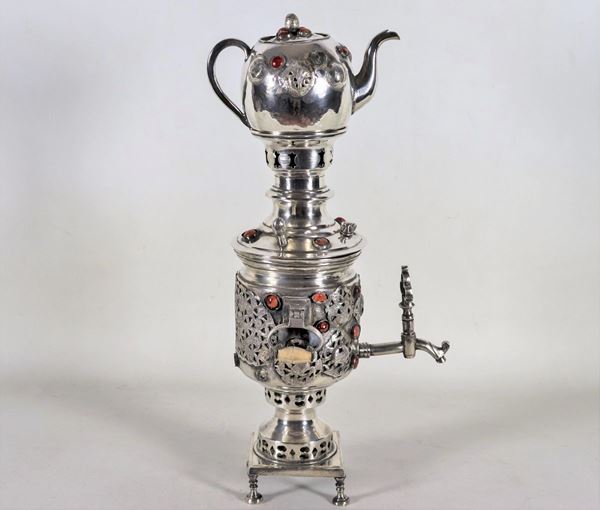 Antique oriental samovar with coffee pot, in embossed and chiseled silver metal