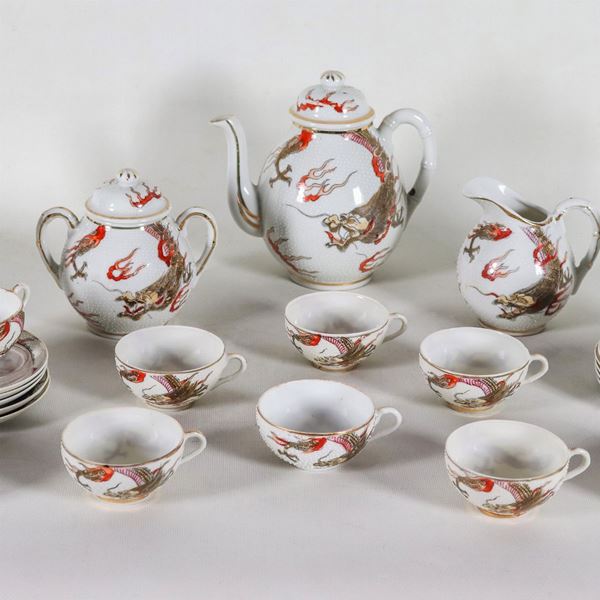 Chinese coffee set in "egg skin" white porcelain, with embossed enamel decorations with dragon and fish motifs (13 pcs)