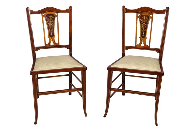 Pair of chairs in walnut with openwork backs and inlaid satin wood and ivory, with bows and floral motifs