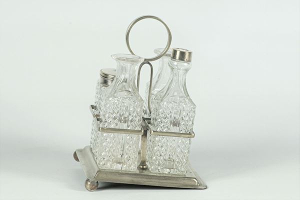 Oil cruet in silver metal
