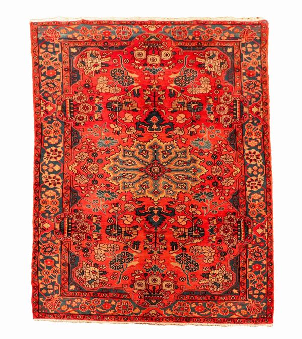 Saveh Persian carpet with geometric motifs on a red background M. 2.33 x 1.54