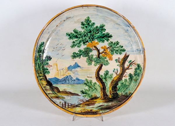 Antique parade plate in enameled and polychrome majolica from Pesaro with scene of "Marina and landscape"