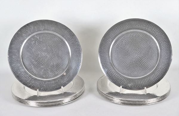 Lot of twelve silver plated, chiseled and hammered metal mats