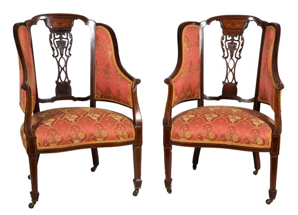 Pair of Edward VII Period mahogany armchairs, with carved backs in Sheraton motifs and curved arms