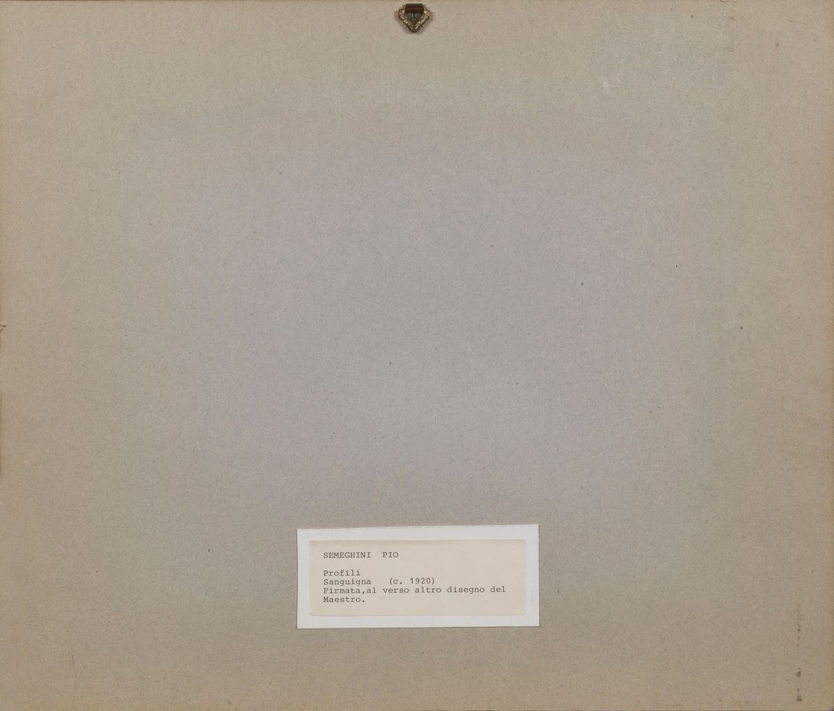 Firmato. "Profili" disegno a sanguigna su carta cm 13 x 18
