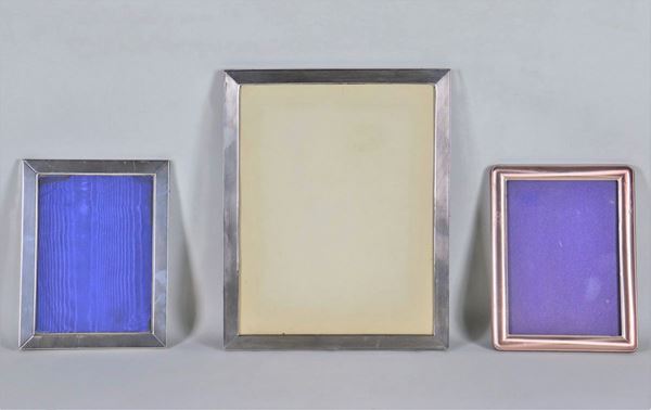 Lot of three silver picture frames, different sizes.