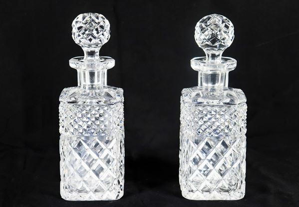 Pair of crystal liqueur bottles, diamond-point worked with geometric motifs