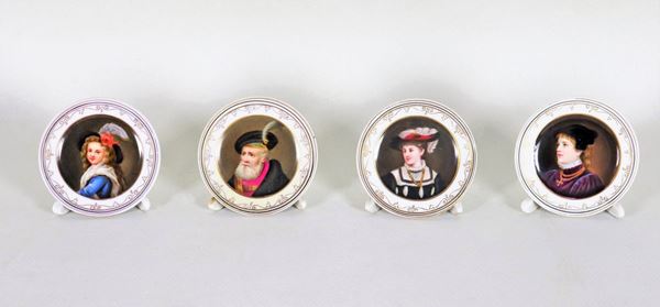Lot of four models of porcelain plates, with decorations painted in the center of "Portraits of noblewomen and noblemen"