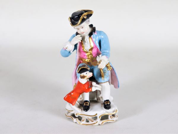 Polychrome porcelain figurine "Boy with monkey"