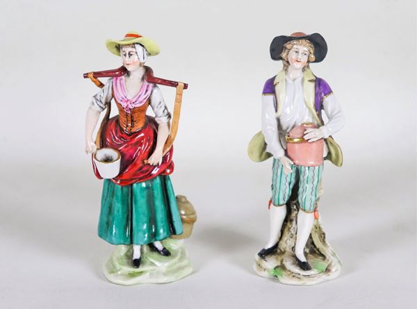 Pair of Capodimonte polychrome porcelain figurines "Peasants"