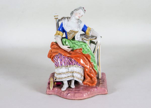 Polychrome porcelain group "Seated young lady"