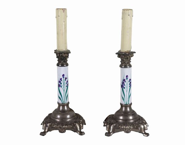 Pair of antique French porcelain and pewter candlesticks