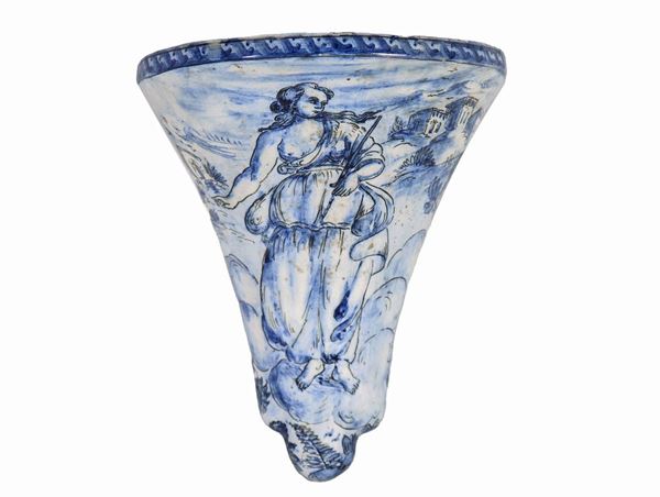 Wall shelf in glazed majolica from Savona, with blue decorations on a white background of a mythological figure and landscape