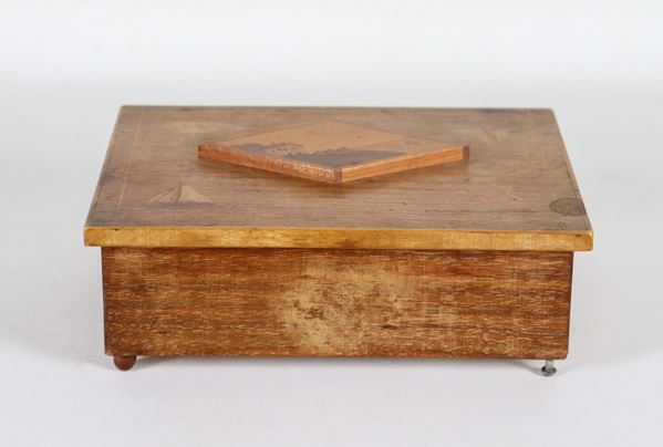 Liberty box in walnut in rectangular shape, on the lid inlaid with "Landscape, boats and fish" motifs