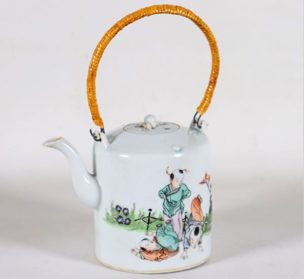 White porcelain teapot with painted oriental life scene decoration, bamboo-coated handle