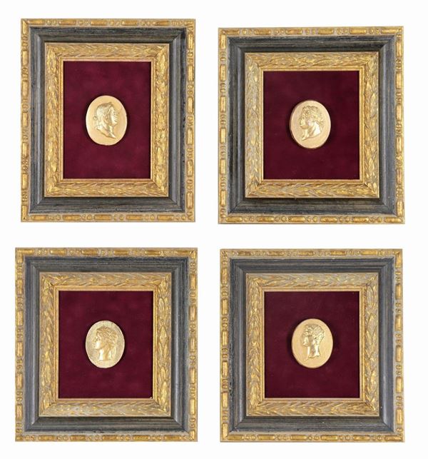 Lot of four small oval medallions "Tiberius, Vespasian, Titus and Augustus" in gilded plaster