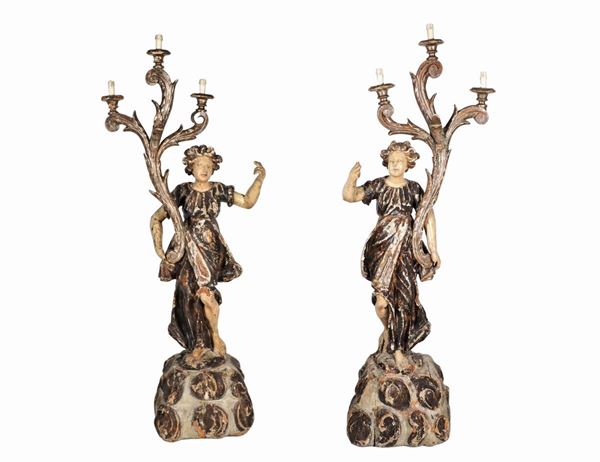 "Angels", pair of large sculptures in carved and polychrome wood, with electric light reduction, three lights each