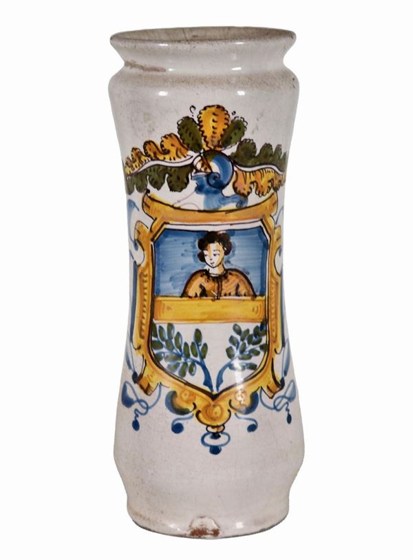 Albarello in maiolica Italia Centrale, con decorazione variopinta a motivo di stemma con figura femminile