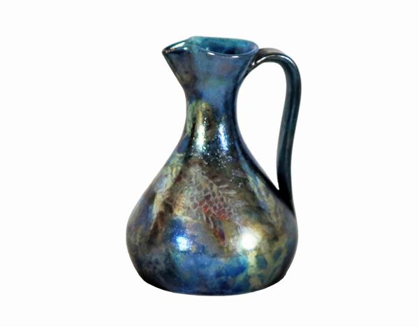 Pietro Melandri - Signed. Glazed ceramic jug with blue and gray background with silver highlights