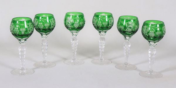 Lot of six liqueur glasses in green Bohemian crystal, worked with bunches of grapes