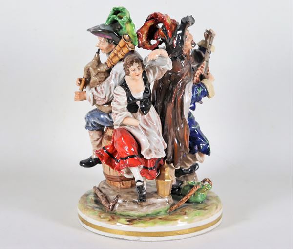 "Beggars players" group, in polychrome and enamelled Capodimonte porcelain