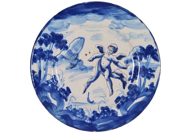 Antico piatto da muro in maiolica di Savona, con decorazioni in blu "Angelo con paesaggio"