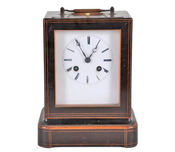 Small travel clock in mahogany, with satin finish wood threads and enamel dial