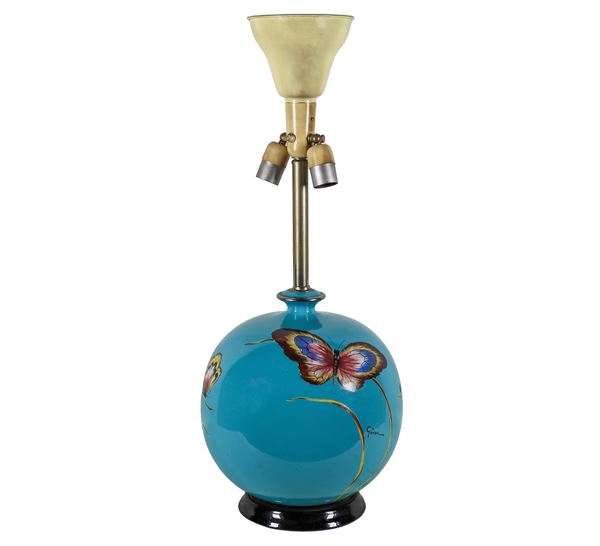 Porcelain and glazed light blue ceramic table lamp, with relief enamel decorations with butterfly motifs