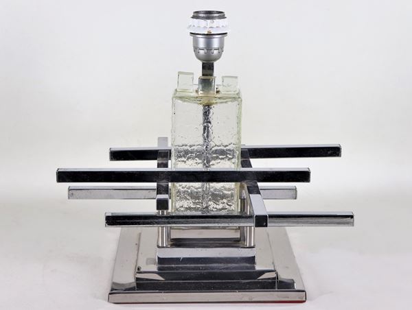 Table lamp in steel and glass