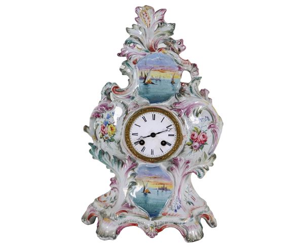 Table clock in Le Nove enamelled majolica, with colorful decorations with motifs of views of Venice and bunches of flowers, white enamel dial