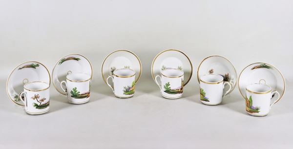 Lot of six Neapolitan porcelain cups and saucers, with colorful decorations with landscape motifs and pure gold profiles