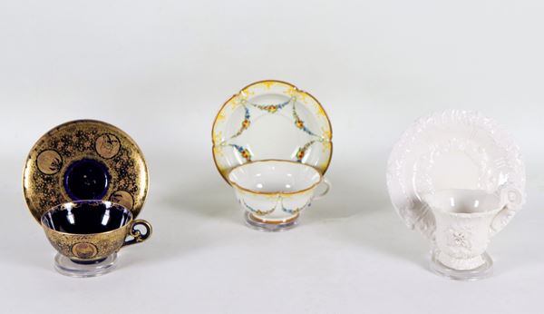 Lotto di due tazze con piattini in porcellana e una tazza con piattino in maiolica Cantagallo (3 pz)
