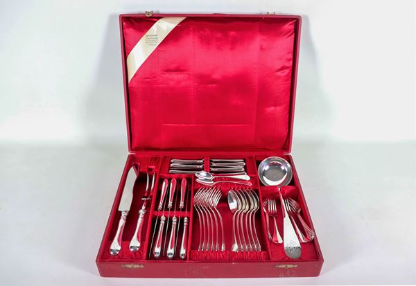Chiseled silver cutlery set for six people with engraved monogram, red leather case (35 pcs), gr. 1350