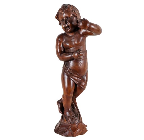 Patinated wooden sculpture "Putto"
