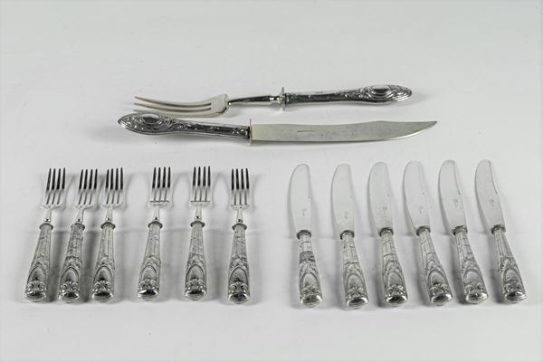 Lot of cutlery with chiseled silver handles