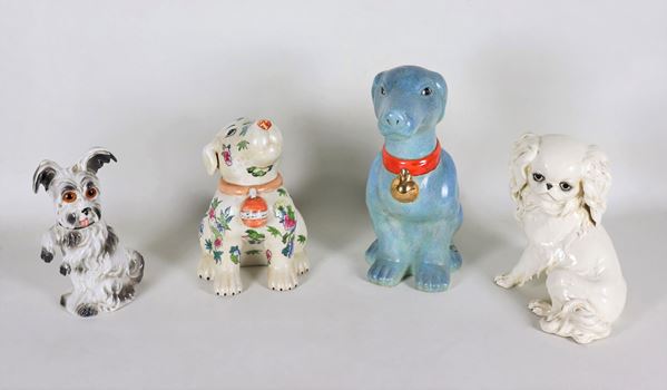Lot of four small "Doggies" sculptures, in porcelain and glazed ceramic