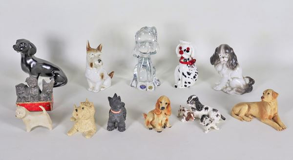 Lot of twelve "Doggies" figurines, in porcelain, crystal, Murano glass and other materials