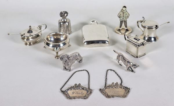 Silver lot of 1 flask, 4 salt shakers of various shapes, 1 child figure, 2 puppies, 1 cork cover and 2 liqueur labels (11 pcs), gr. 410