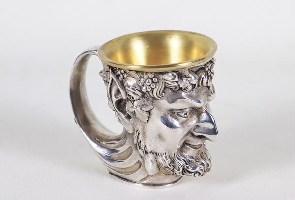 Small silver mug, carved with the head of Bacchus and bunches of grapes, inside commemorative engraving "Villa a Sesta Siena", gr. 300