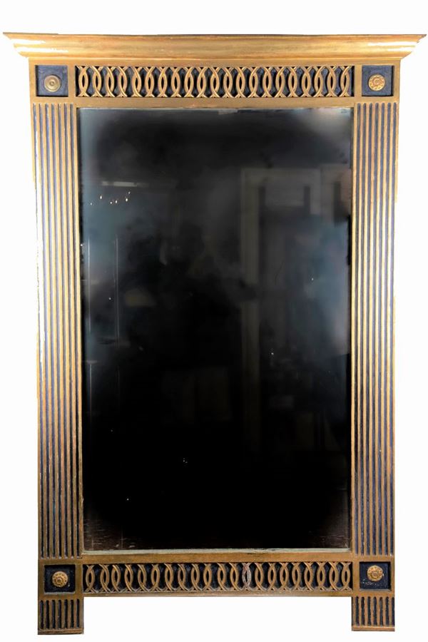 Specchiera in legno dorato e laccato nero