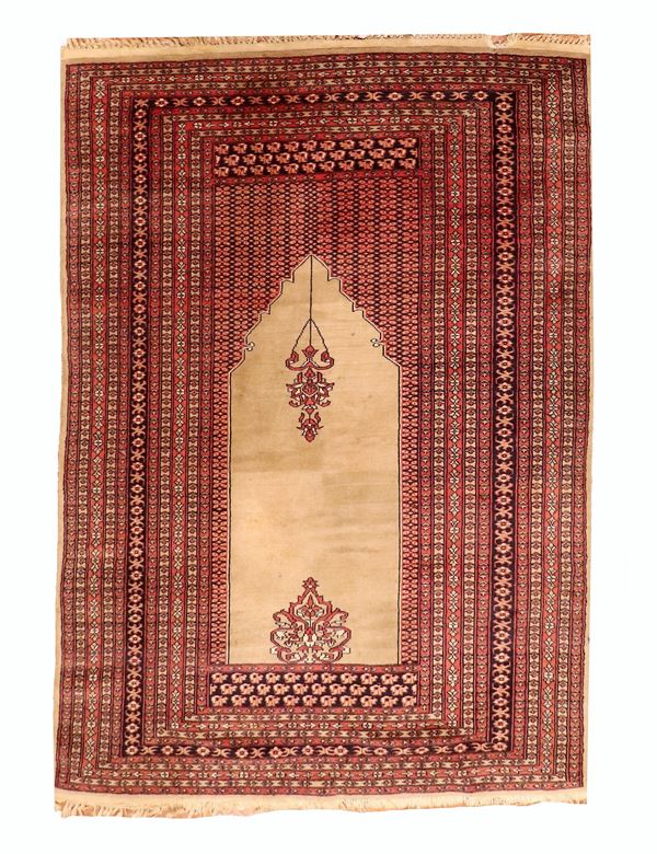 Baku prayer carpet on a brown and red background, M. 1.86 x 1.27