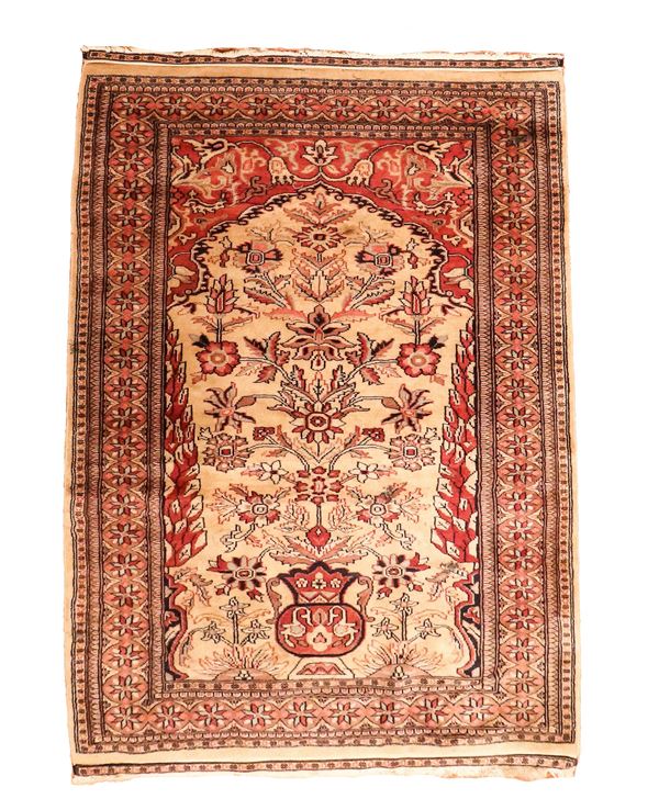 Heriz carpet with geometric and floral designs on a havana and red background, M. 1.63 x 0.94