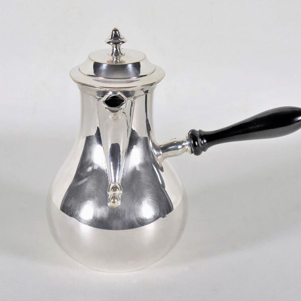 Coffee pot in silvered and embossed metal, handle in ebonized wood