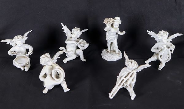 Lotto di sei statuine in porcellana bianca Capodimonte "Puttini suonatori"