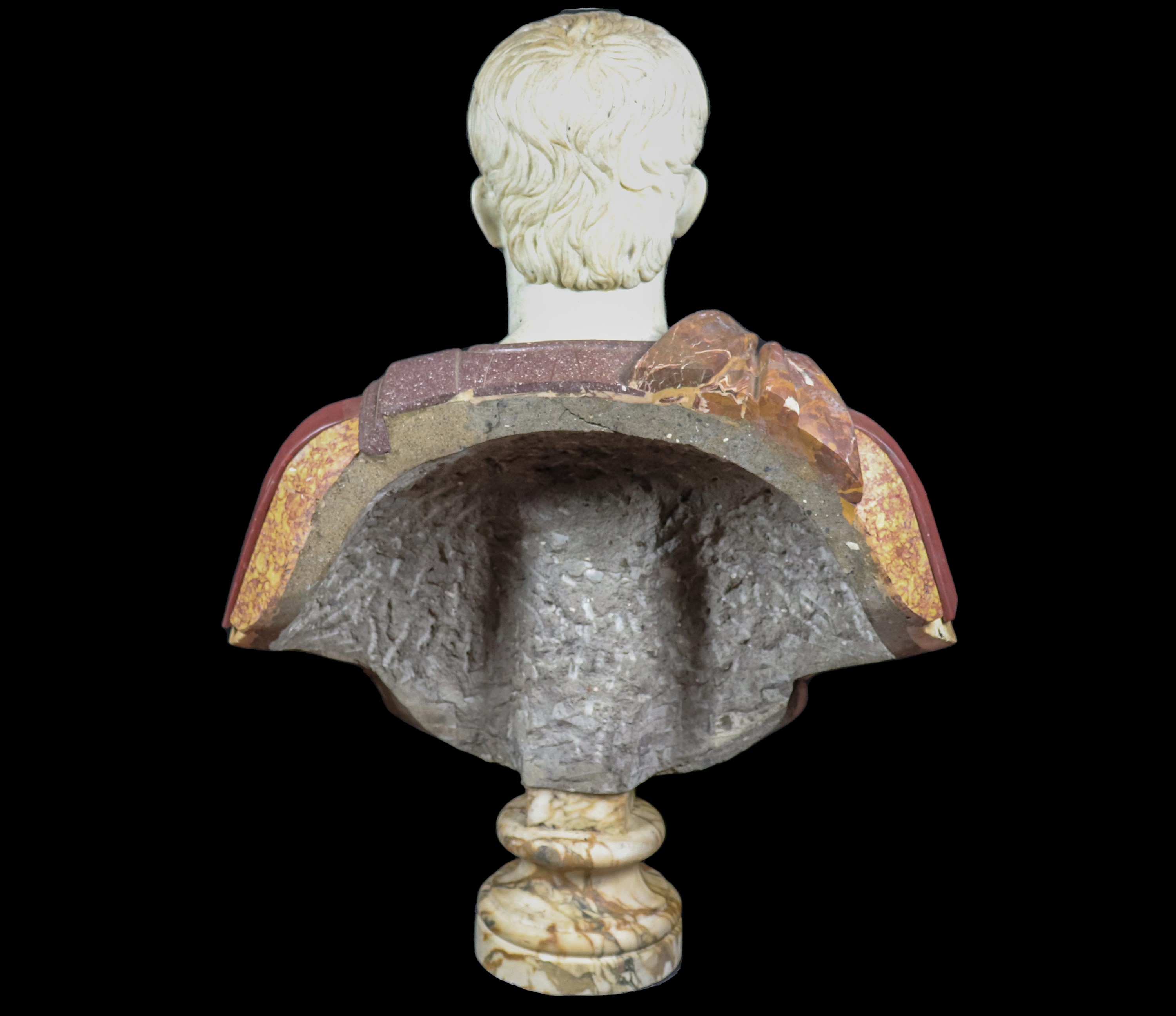 "Imperatore Romano", busto in vari marmi pregiati, base a sezione di colonna tornita