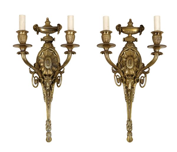 Pair of French appliques in gilt bronze, embossed and chiseled with Louis XVI motifs, 2 lights each