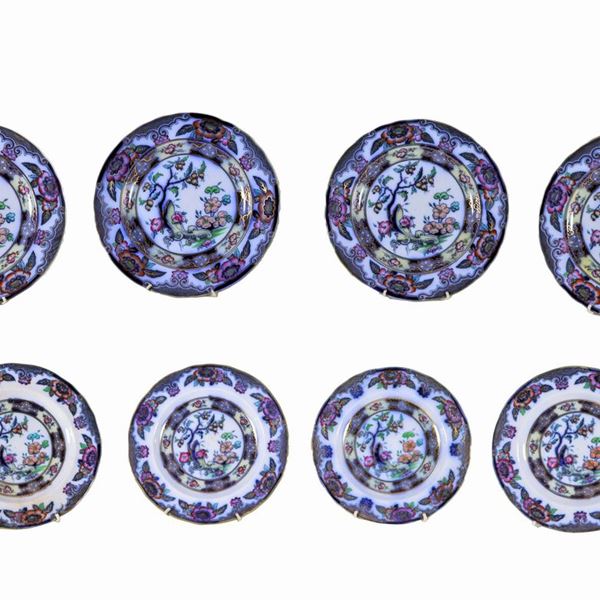 Lot of eight antique English porcelain plates, with colorful decorations with floral motifs, four large and four small