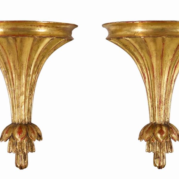 Pair of small wall shelves in gilded wood carved with Louis XVI motifs