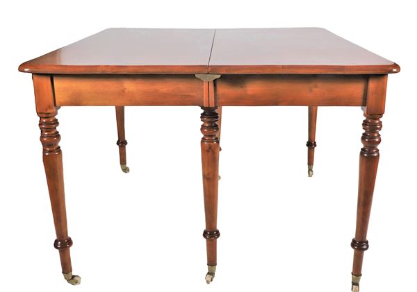 Ancient Italian extensible dining table in cherry wood, with six legs with turned columns, opening mechanism called "a concertino" and two original extension tables