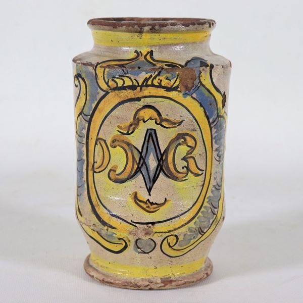 Ancient pharmacy albarello in Tuscan majolica with polychrome medallion, lacks and defects